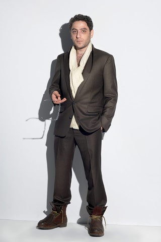 brown tailored suit with ivory sweater
