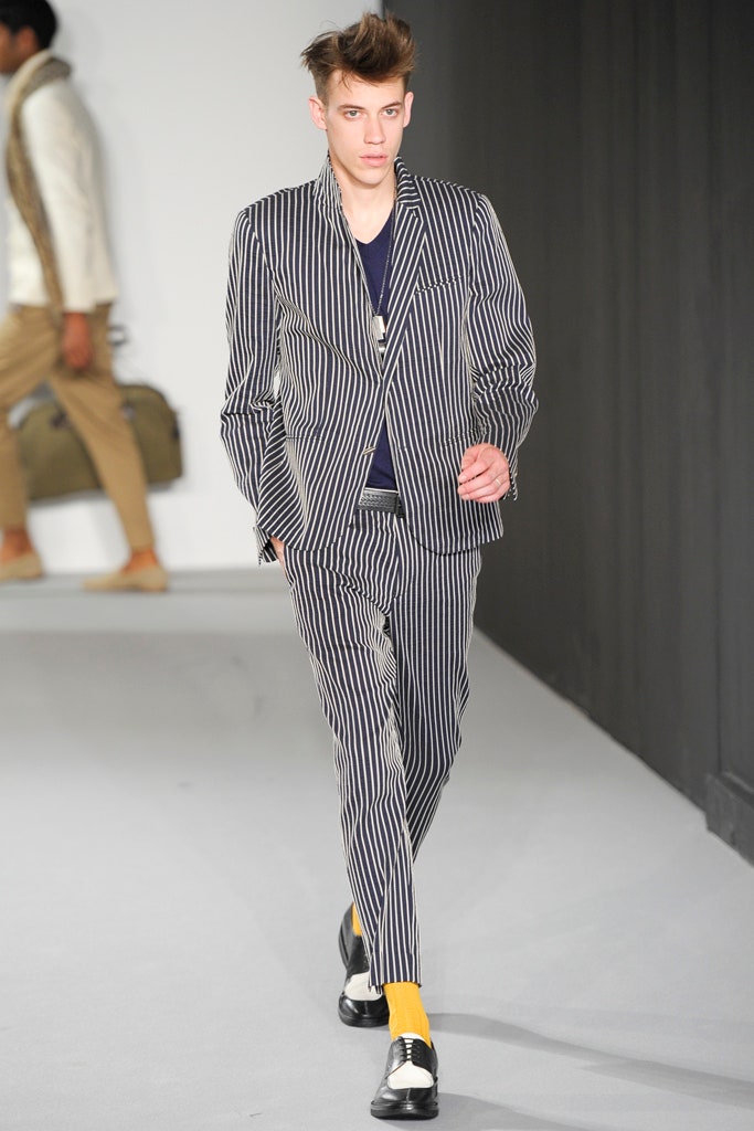 striped tailored suit with navy shirt