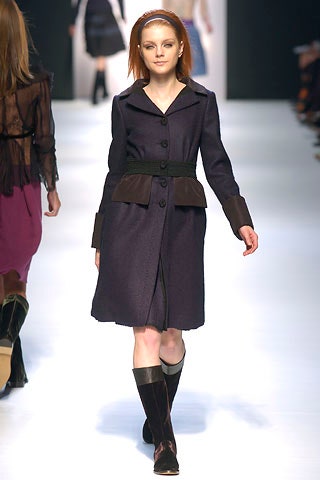 fitted purple wool coat with knee-high boots