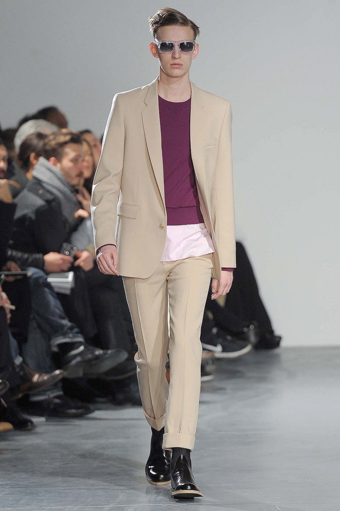 beige tailored suit with purple top