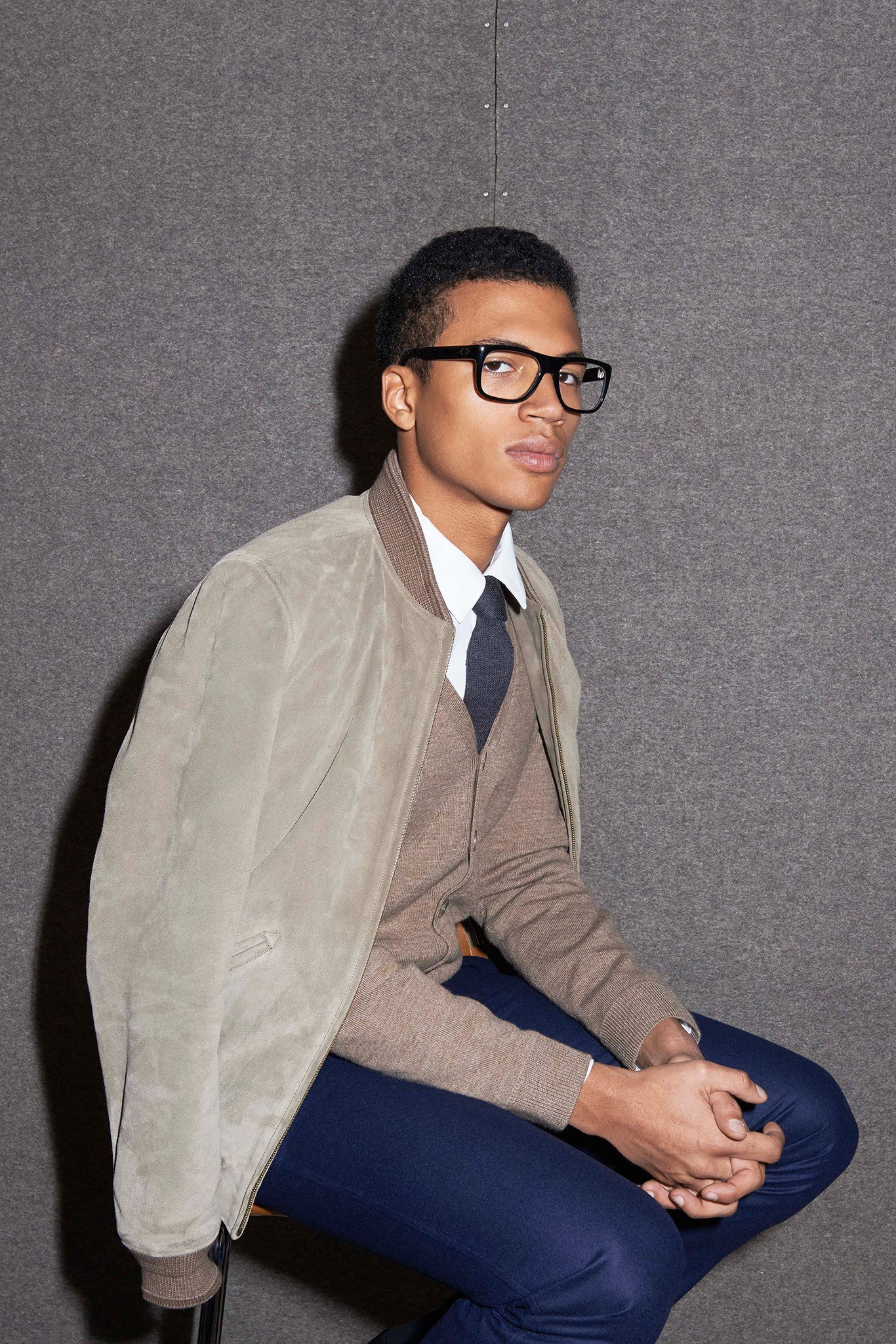 beige suede jacket with brown sweater