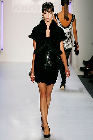 black mini dress with faux-fur bolero