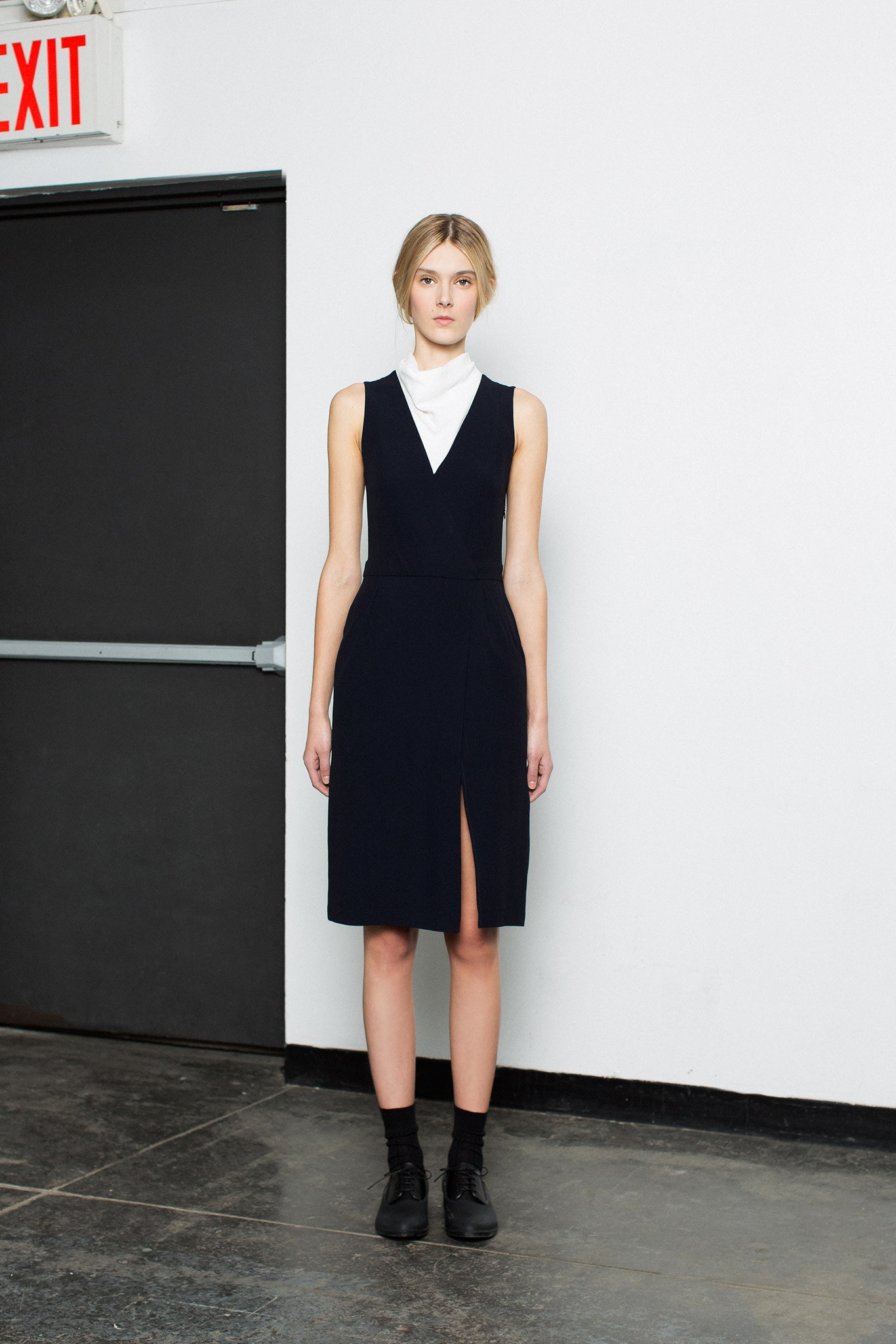 black cotton sleeveless v-neck fitted structured midi dress
