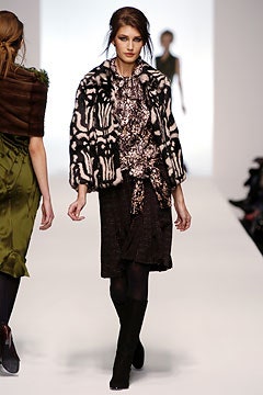 black and pink faux-fur coat with brown silk dress