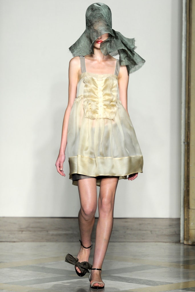ivory relaxed ruffled mini dress with gray hat