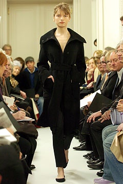 black fitted coat and pants