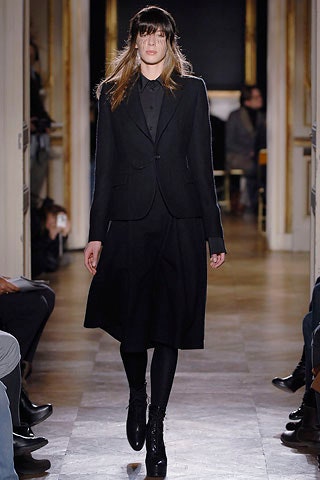 black tailored blazer and midi skirt