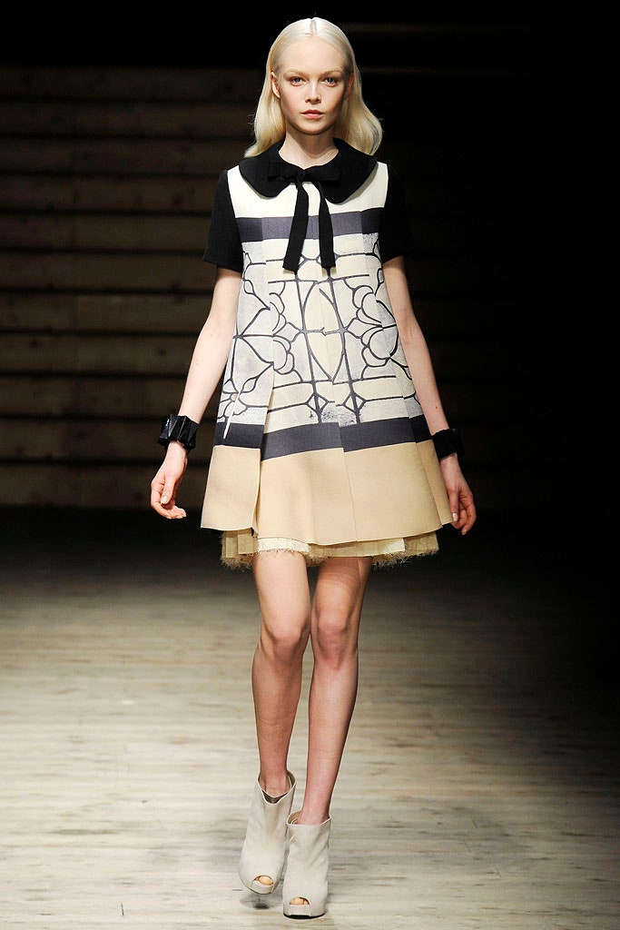 black and beige printed mini dress