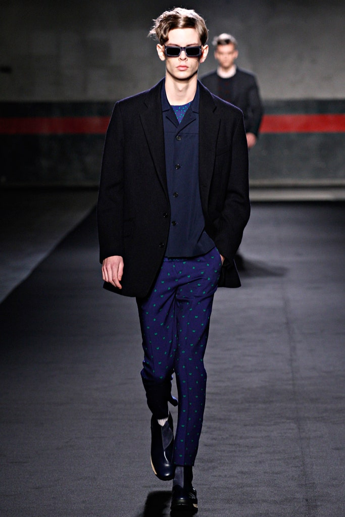black blazer with blue shirt and printed pants