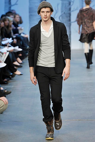 black tailored blazer with slim pants