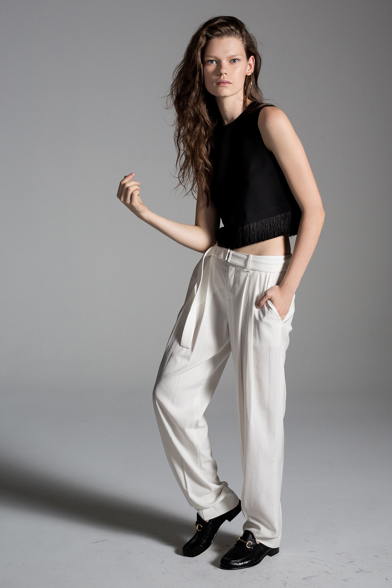 black cropped top with fringes