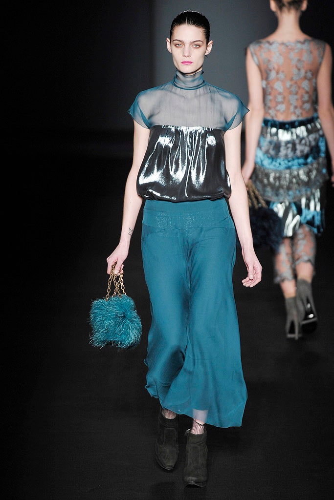 black silk top with blue skirt