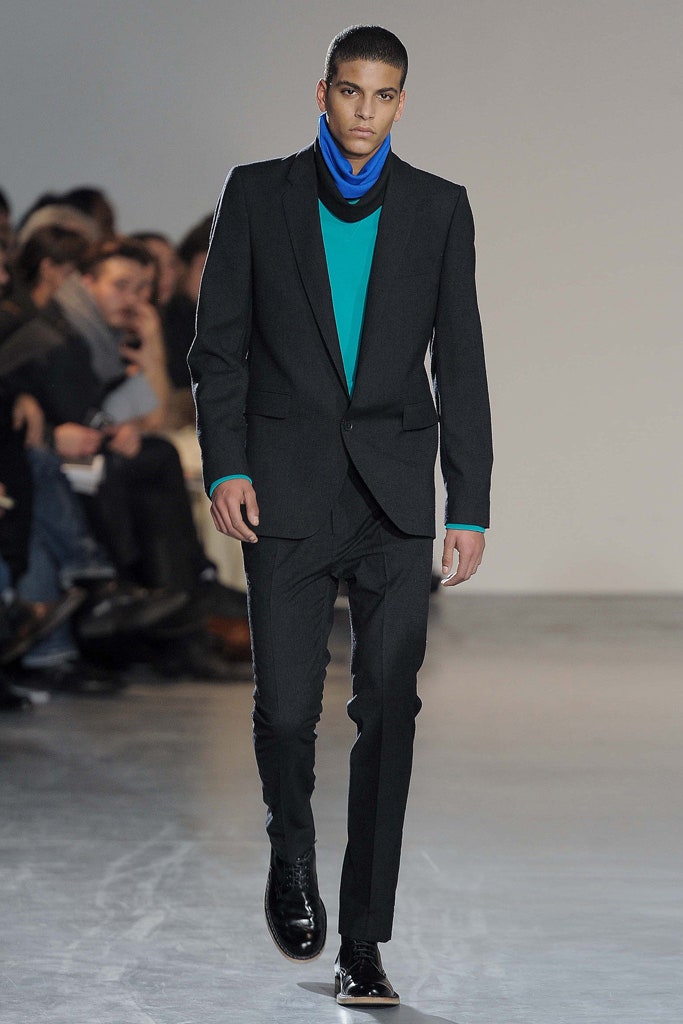 black tailored suit with colorful top