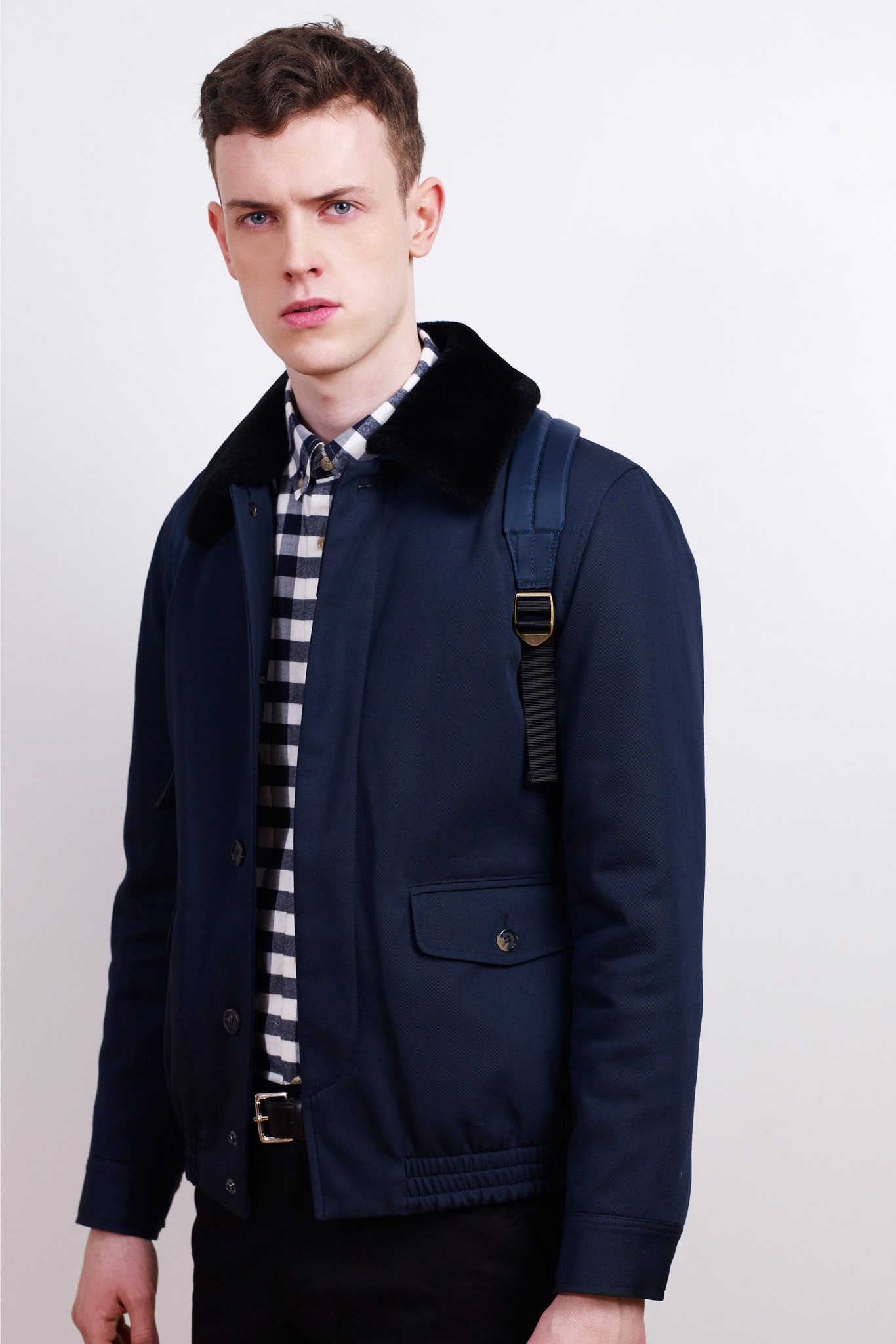 navy fitted jacket with checked shirt