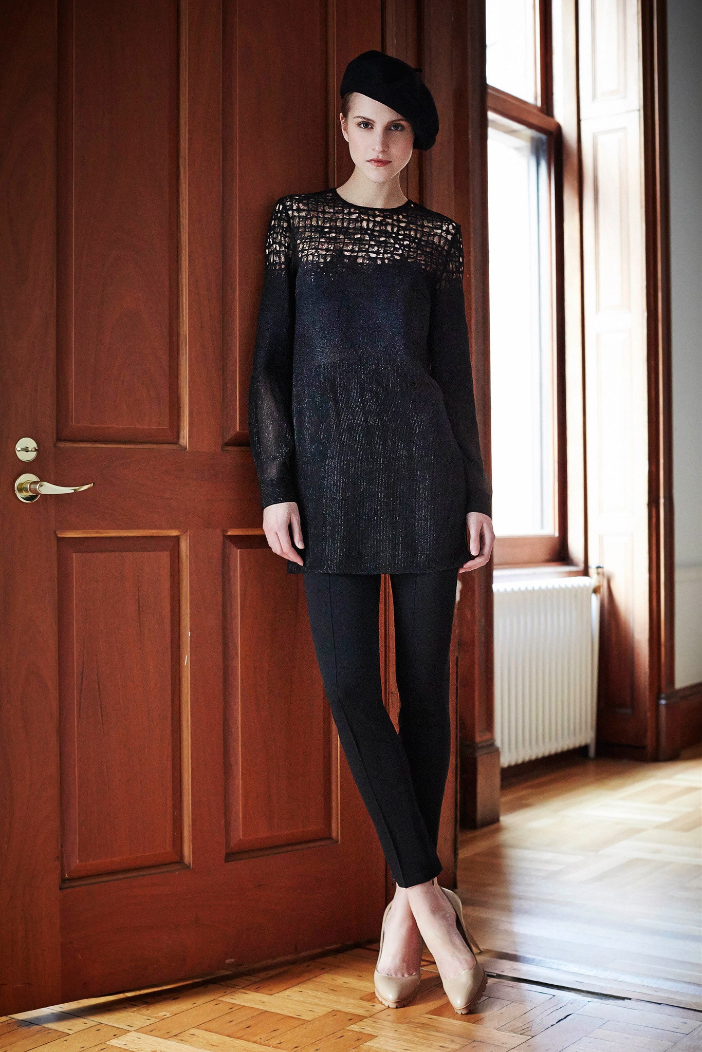 black fitted top with slim pants