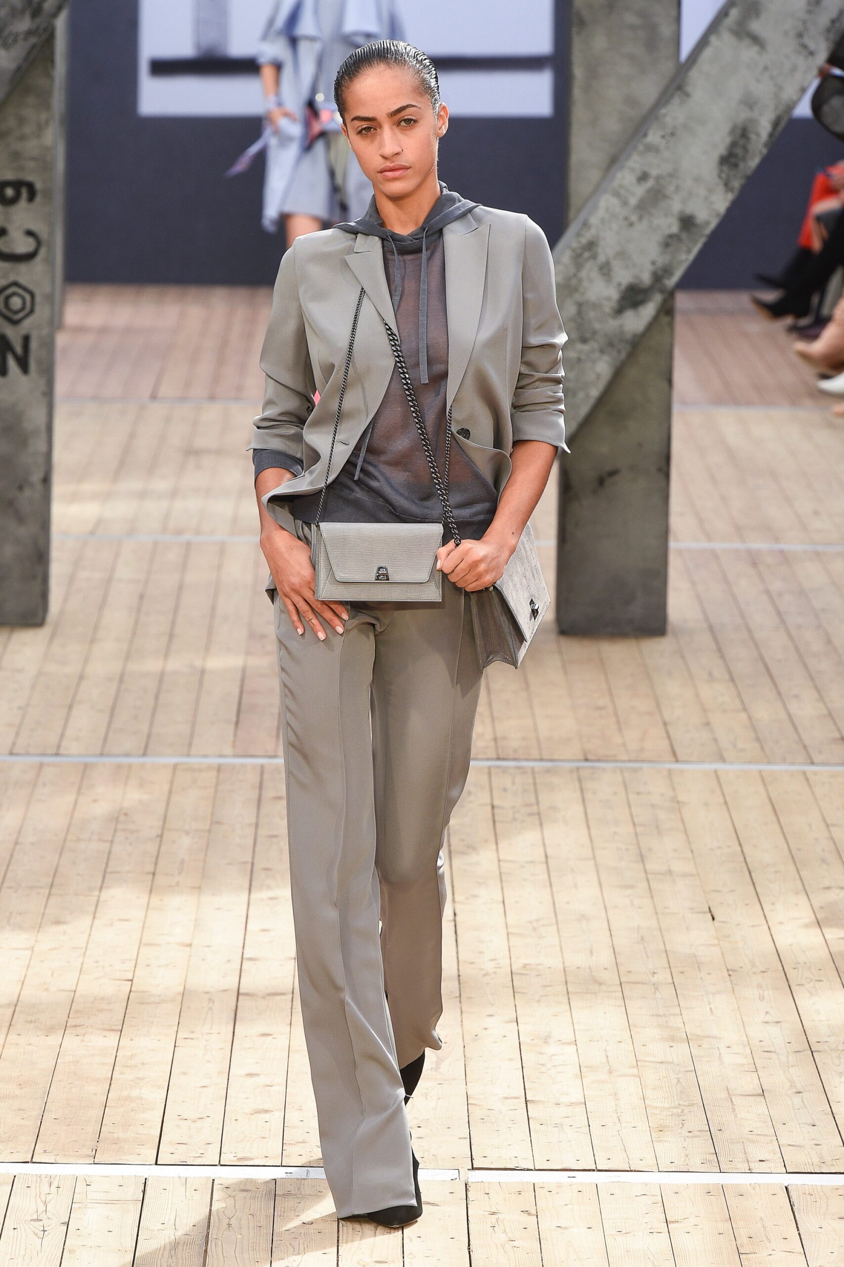 gray fitted suit with black hoodie