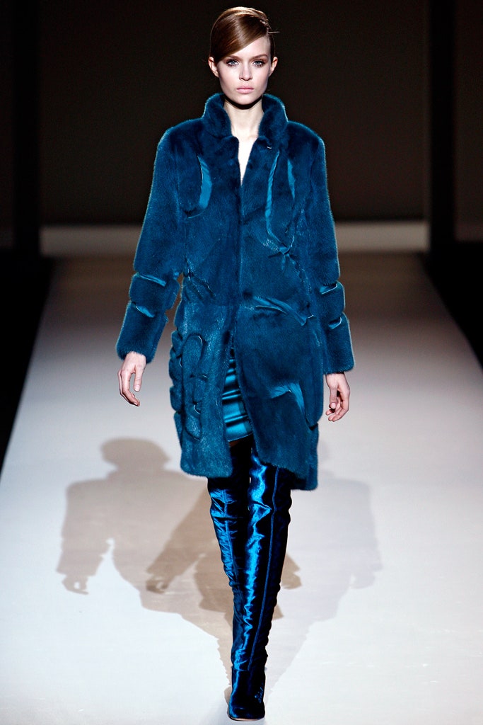 blue fur coat with vinyl pants