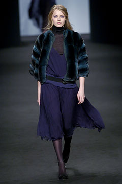 blue silk midi dress with green faux-fur coat
