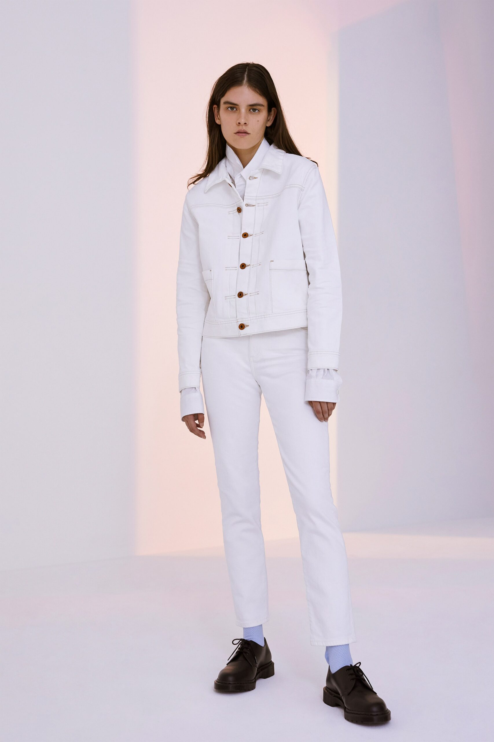 white fitted jacket with slim pants