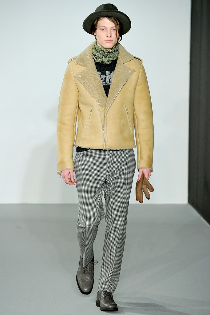 beige leather jacket with gray pants