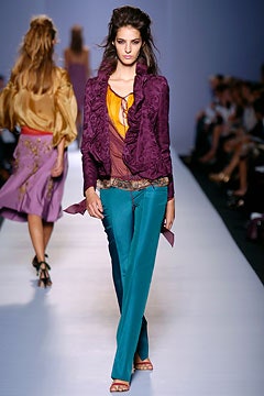 purple silk fitted jacket with teal pants