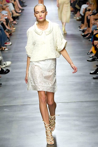 white relaxed top with ivory skirt