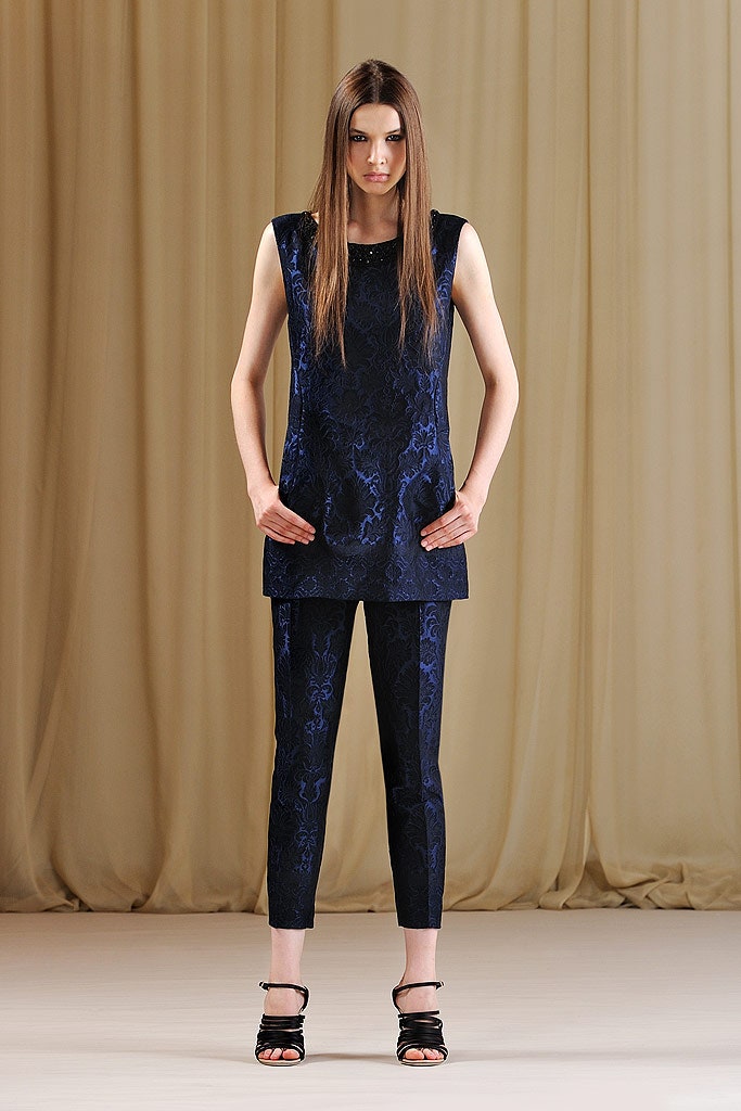 blue silk sleeveless top with slim pants