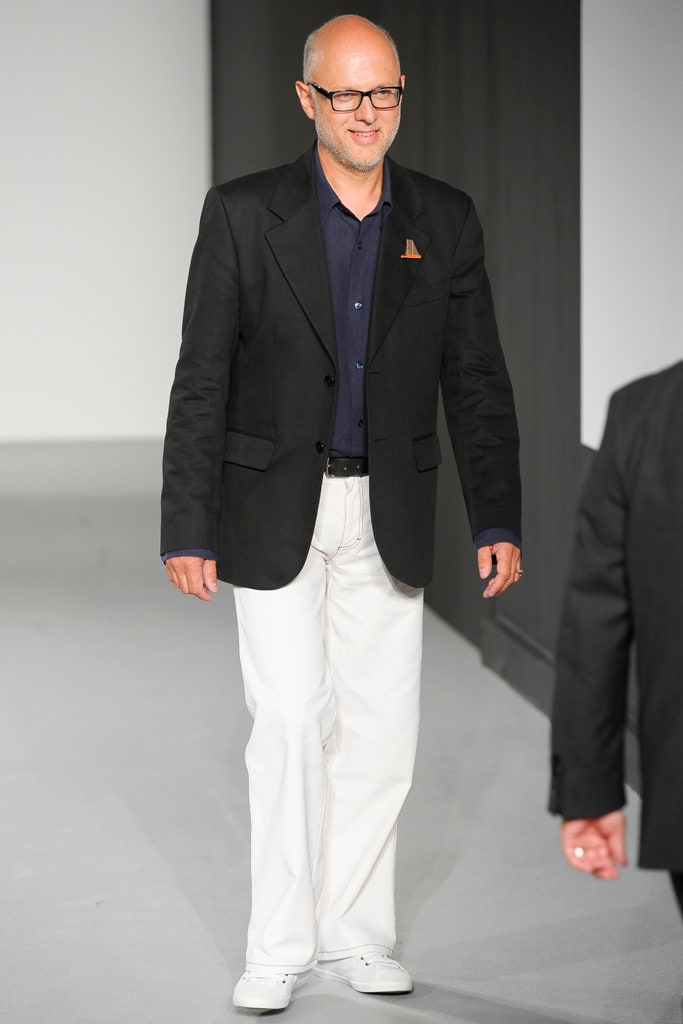 black blazer blue shirt white pants