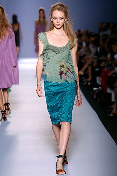 green silk ruffled top with blue pencil skirt