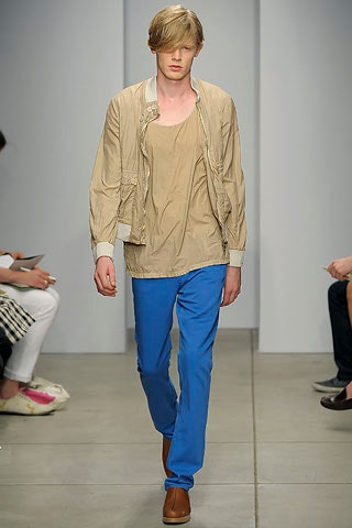 beige jacket with blue pants