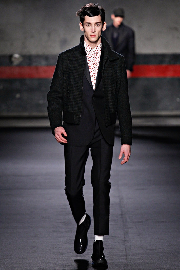 black wool long-sleeve collared tailored buttoned jacket