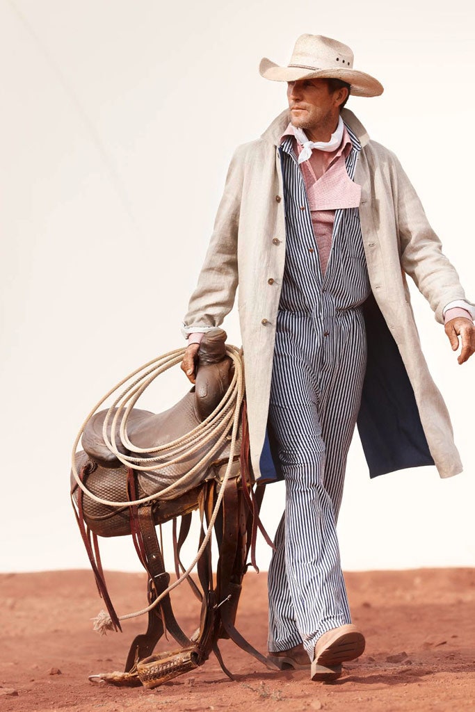 beige coat with blue jumpsuit