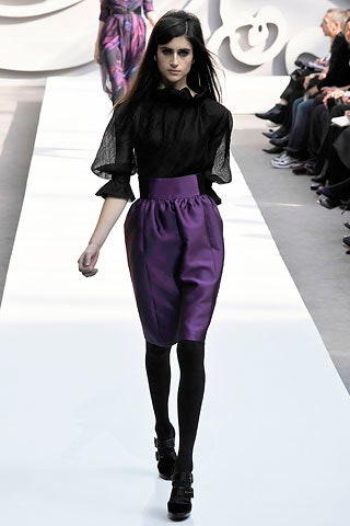 black silk blouse and purple satin skirt