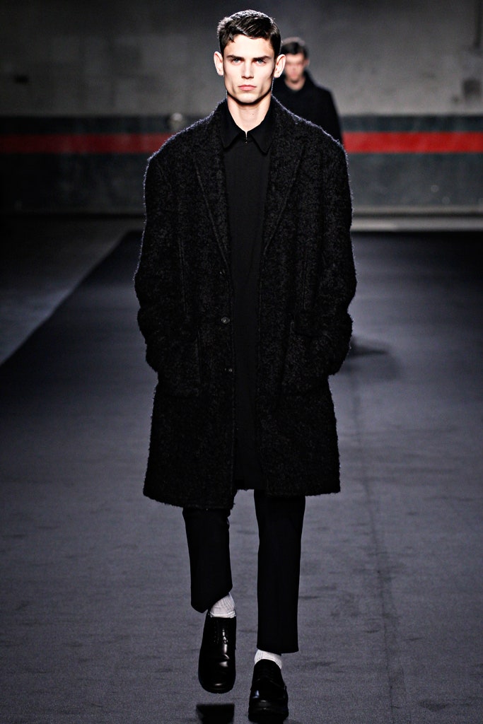 black wool coat with tailored pants