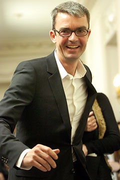 black tailored suit with white shirt