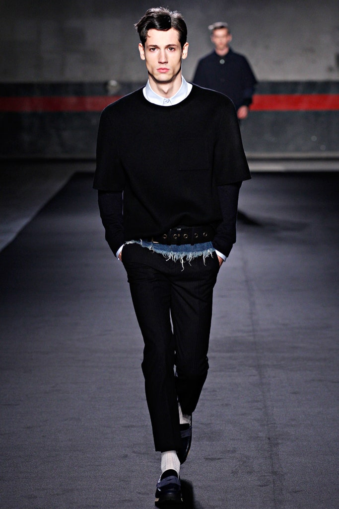 black relaxed top and slim pants