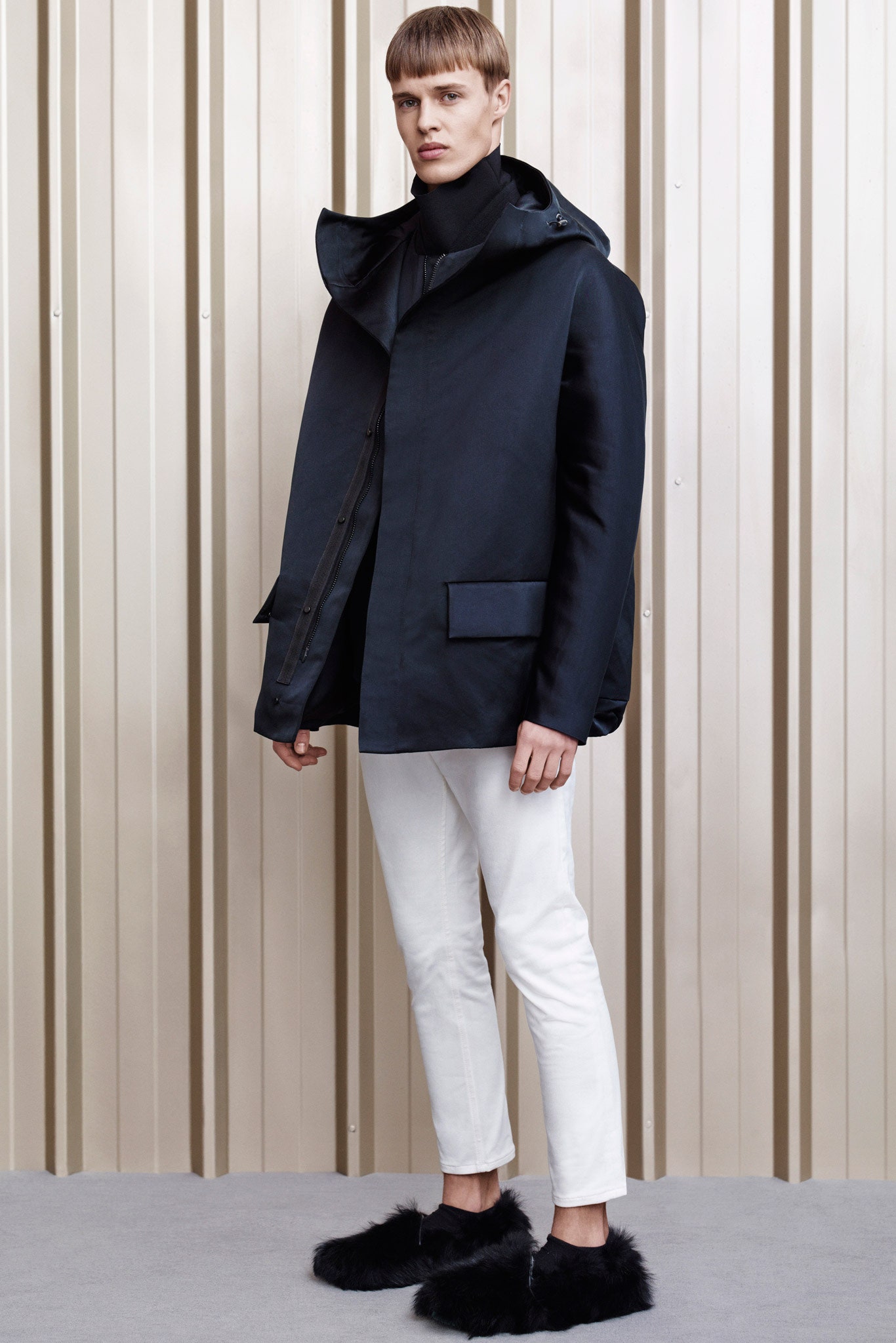 black hooded jacket with white pants