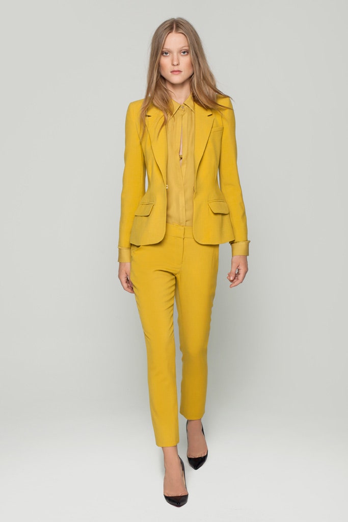 yellow tailored suit with beige shirt