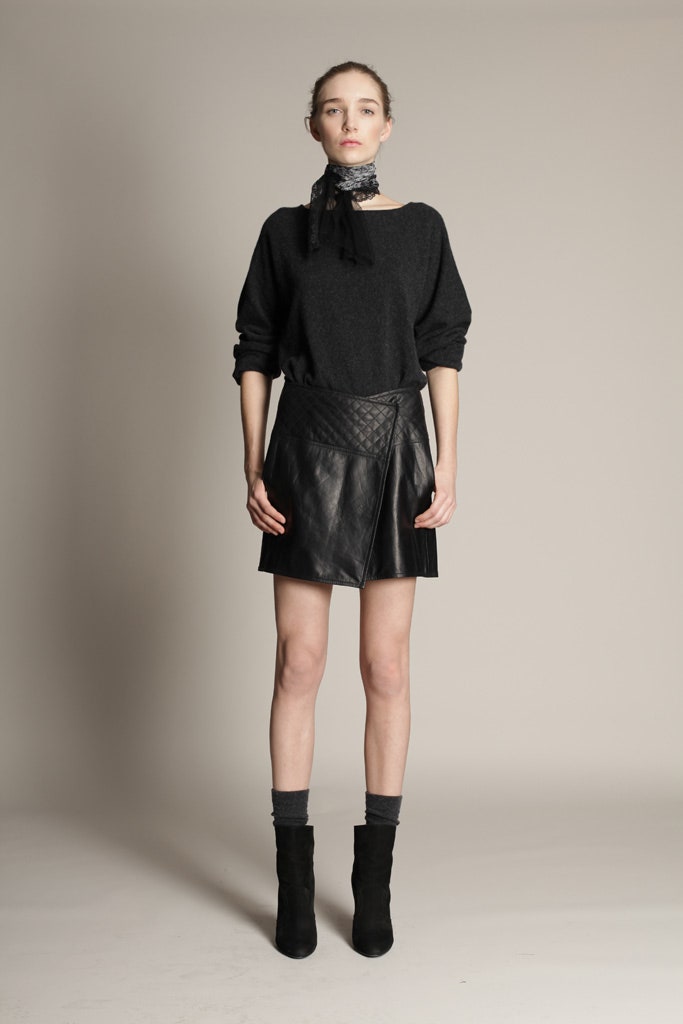 black wool sweater with leather skirt