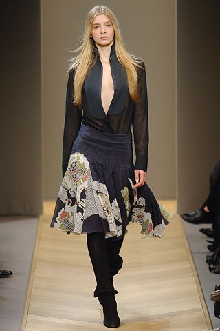 black silk fitted shirt and multi pleated skirt