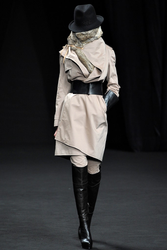 beige trench coat with black accessories
