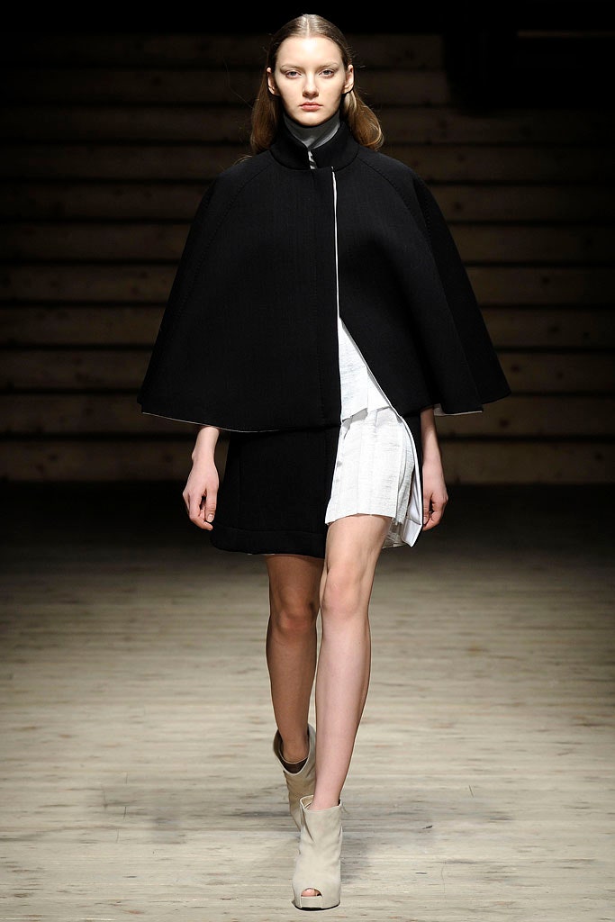 black wool cape and white dress