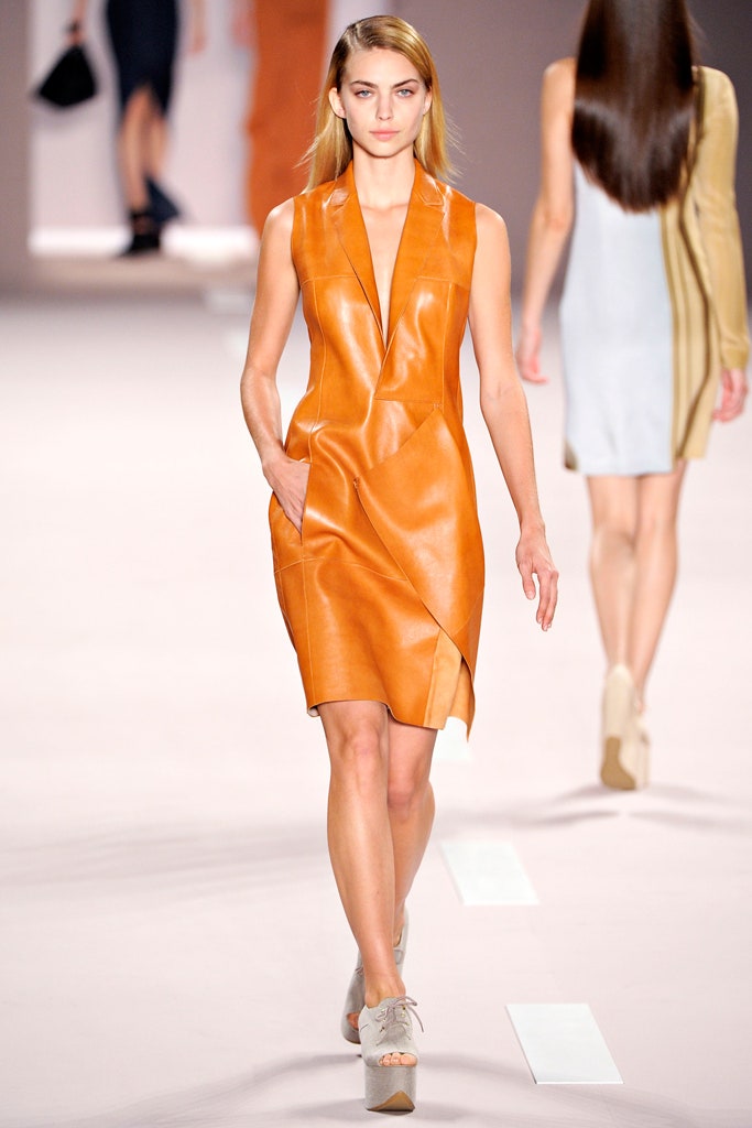 fitted orange leather sleeveless dress