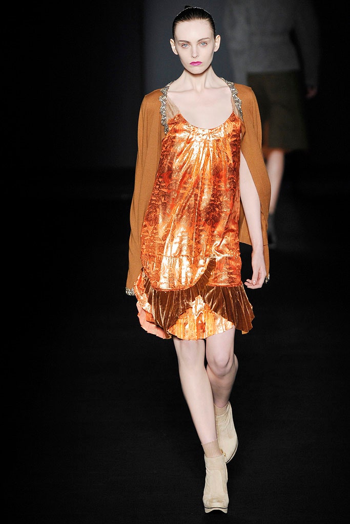 orange silk mini dress with brown cardigan