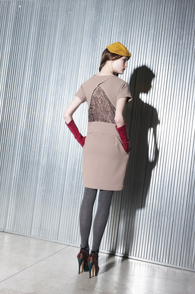 beige fitted mini dress with leggings