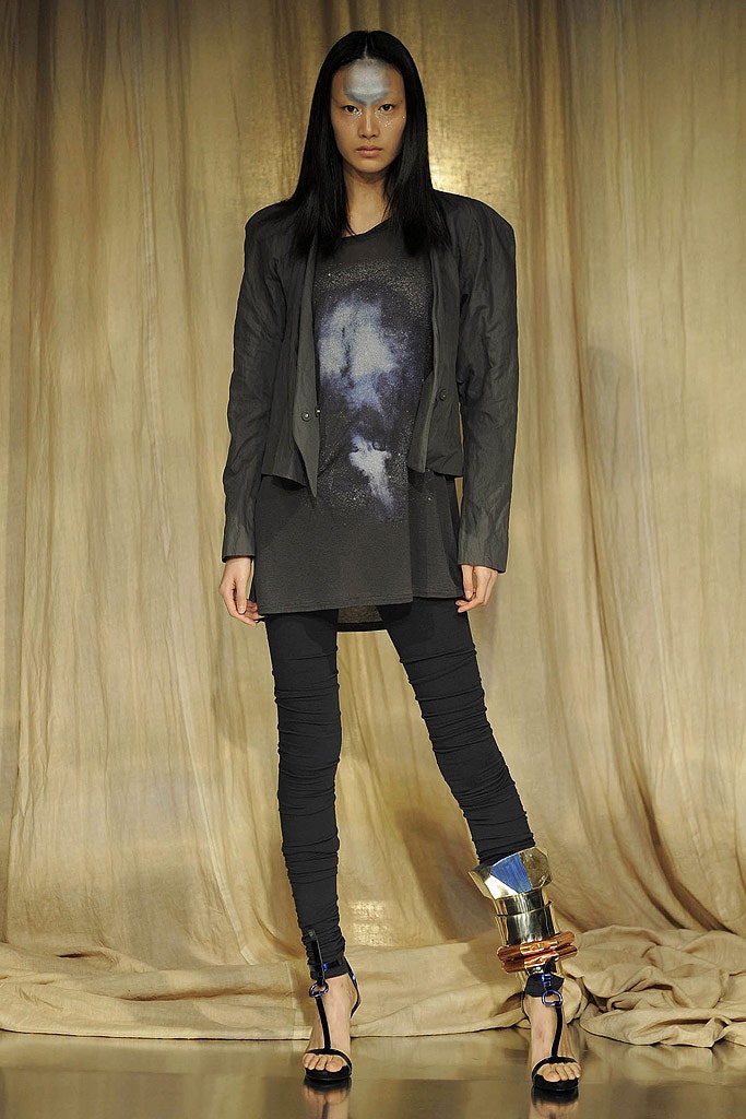 black structured jacket and relaxed top