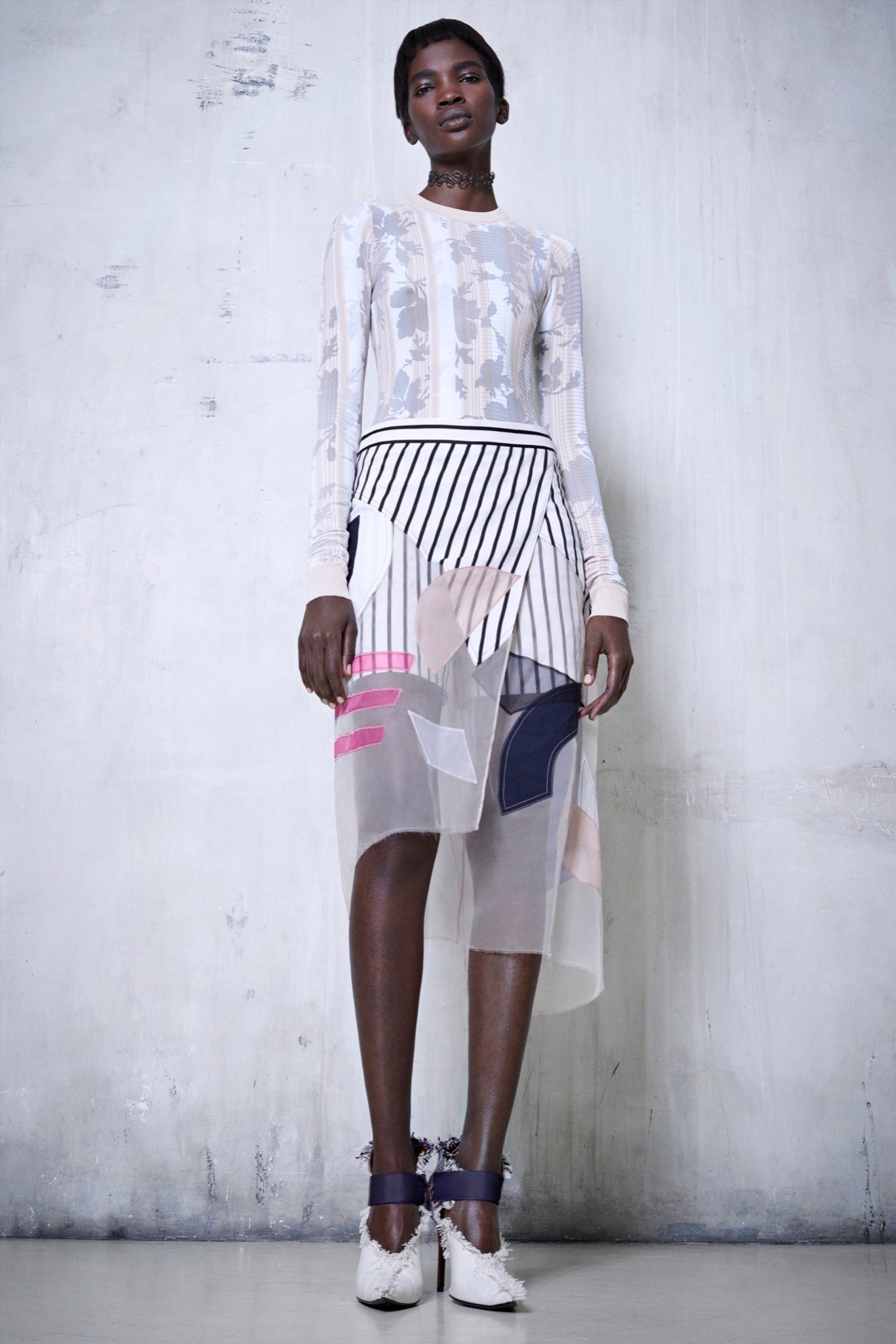 sheer white top with asymmetric skirt