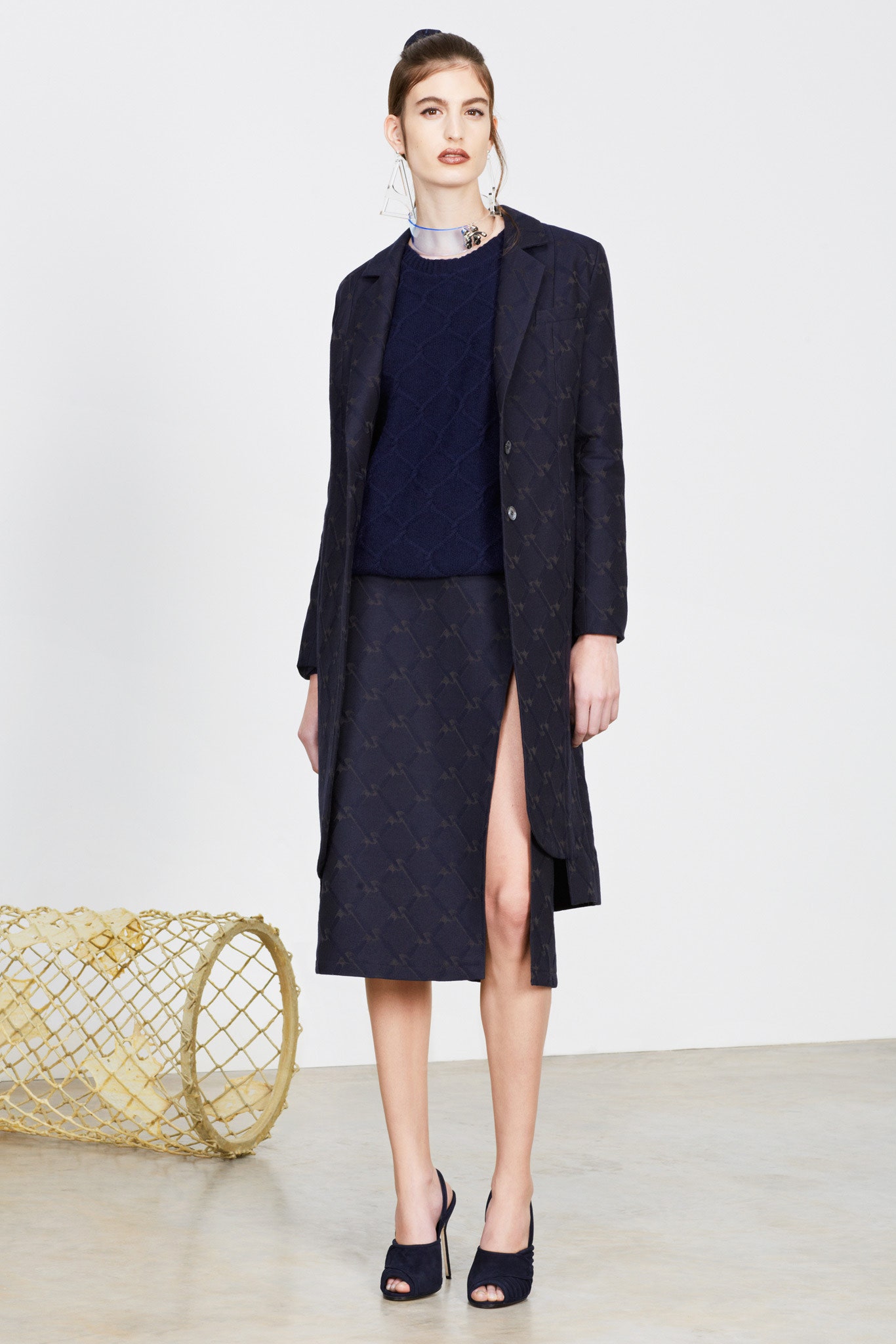 navy tailored coat with fitted sweater