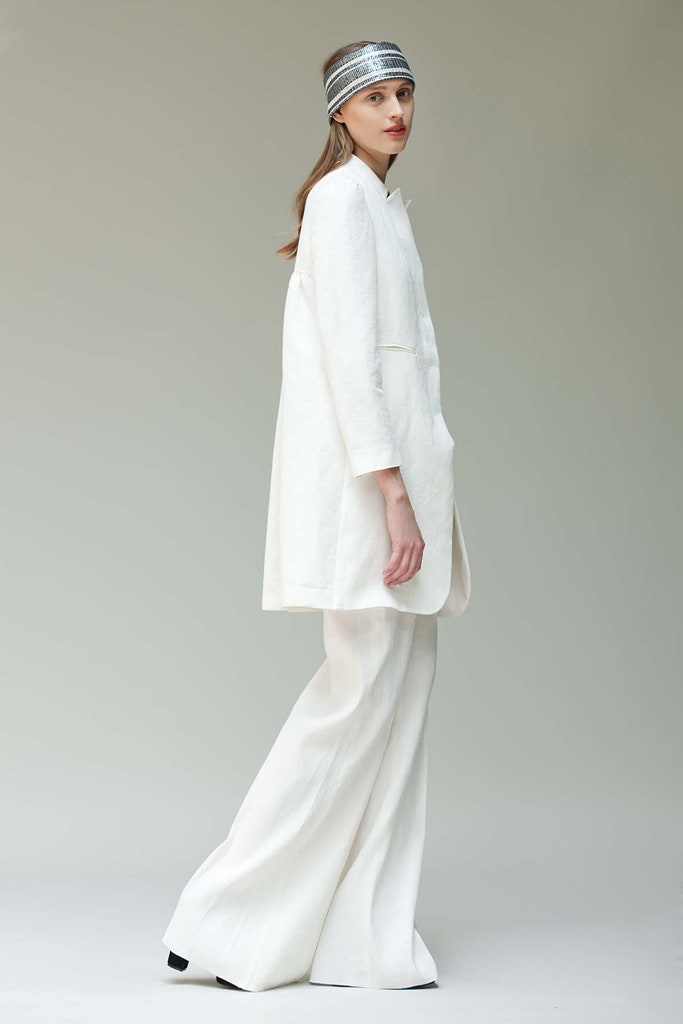 white relaxed jacket and flared pants