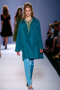 teal silk coat with blue pants